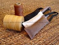 Dog bite tug made of leather with handle Dog bite tug made of leather with handle
